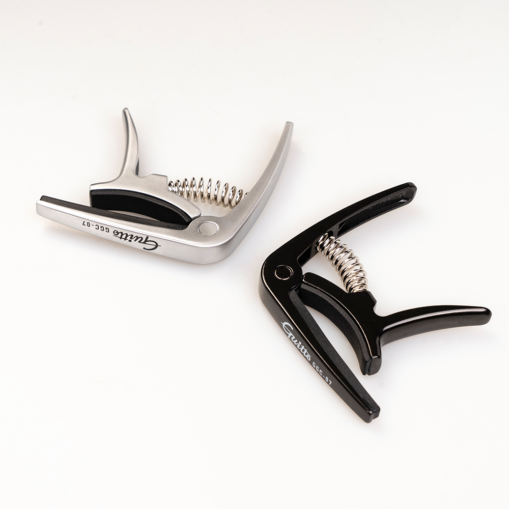 GUITTO GGC-07 Ukulele Capo Qui - Musical Instrument Note recension och pris